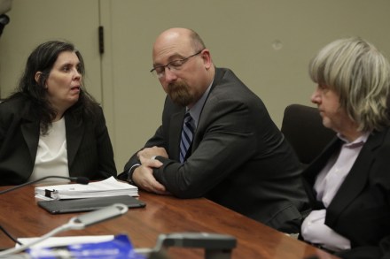 POOL PHOTO; MANDATORY CREDIT.Mandatory Credit: Photo by GINA FERAZZI/POOL/EPA-EFE/REX/Shutterstock (9325684h)Louise Turpin (L) and attorney Jeff Moore (C) David Turpin (R) appear in court for arraignment on charges against the two in relation to their 13 malnourished children found chained in their home in Riverside, California, USA, 18 January 2018. The two parents were charged with multiple counts of Child abuse, torture, abuse of dependent adults and false imprisonment and could face close to 100 years to life in prison if convicted.Charges filed in case of 13 siblings found in Perris, California home, Riverside, USA - 18 Jan 2018