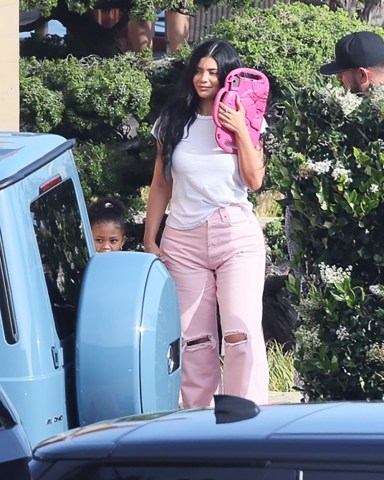 *EXCLUSIVE* Malibu, CA  - Kylie Jenner looks stunning leaving Nobu restaurant with daughter Stormi.  Pictured: Kylie Jenner  BACKGRID USA 7 JUNE 2022   USA: +1 310 798 9111 / usasales@backgrid.com  UK: +44 208 344 2007 / uksales@backgrid.com  *UK Clients - Pictures Containing Children Please Pixelate Face Prior To Publication*