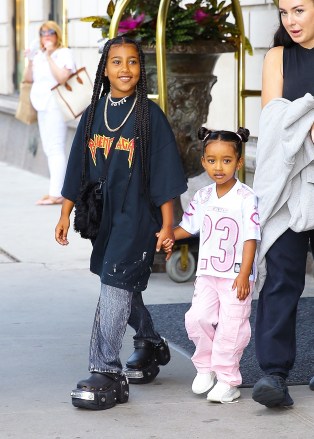 New York, NY - North West was in 'big sister mode' as she held little sister Chicago West's hand while leaving the Ritz Hotel in New York.  Illustrated: Chicago West, North West BACKGRID USA 15 JULY 2022 BYLINE MUST READ: Fernando Ramales / BACKGRID USA: +1 310 798 9111 / usasales@backgrid.com UK: +44 208 344 2007 / uksales@backgrid.com *UK Clients The photos with children please pixelate the face before publishing *