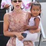 Kim Kardashian and Kanye West touch down in Miami after their 'make or break' vacation in the Dominican Republic. Their private jet left Punta Cana’s private airfield early Sunday morning. There have been no reports as yeton the state of their marriage although rapper Kanye did post a happy family video at the end of last week. In the short clip, West, 43, clad in a hockey jersey, sings what seems to be a snippet from Rebecca Black’s “Friday,” before hopping out of the golf cart he was riding in and dancing alongside it. Kardashian, who seems to be filming, can be heard laughing in the background. There have been no other sightings of the couple who went to extreme lengths not to be seen during the seven-day trip. They stayed in the luxurious Villa Tartaruga at the exclusive Puntacana Resort & Club. Sources say the rapper "suggested they take a family trip together" amid their marital crisis, which saw Kanye, 43, claim he'd been trying to divorce Kim, 39, for two years back in July. Kim and Kanye's marital problems became public knowledge after the rapper shared private details of their life during his presidential rally in July, including the claim that they considered aborting North. Their make or break vacation comes amid claims North would prefer to live with her dad rather than mom Kim. The couple also shares four-year-old son Saint, two-year-old daughter Chicago and one-year-old son Psalm. After Kanye’s meltdown, where he received visitors ranging from Justin Bieber to Dave Chappelle, West visited a Wyoming hospital after he and Kardashian were seen locked in an intense discussion in a parked car. 09 Aug 2020 Pictured: Kim and Kanye. Photo credit: MEGA TheMegaAgency.com +1 888 505 6342 (Mega Agency TagID: MEGA693381_008.jpg) [Photo via Mega Agency]