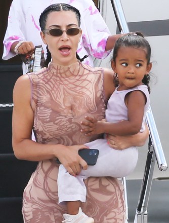 Kim Kardashian and Kanye West touch down in Miami after their 'make or break' vacation in the Dominican Republic. Their private jet departed Punta Cana's private airfield early Sunday morning. had no report as yet on the status of their marriage although rapper Kanye posted a happy family video late last week. In the short clip, West, 43, dressed in a hockey jersey, sings what appears to be a snippet of 