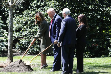 (LR) First Lady of the United States Melania Trump, President of the United States Donald J.  Trump, US Vice President Mike Pence and US Second Lady Karen Pence attend a tree-planting ceremony to mark Earth Day and the White House Pavilion Day at White House, Washington, DC, April 22, 2020. Earth Day at the White House, Washington, USA - April 22, 2020