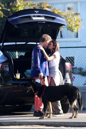 Venice, CA  - *EXCLUSIVE*  - Emily Ratajkowski and husband Sebastian Bear-McClard visit the beach this early evening to walk their dog Columbo down the coast.  The young couple had an impromptu picnic out of the real of their Tesla X and then watch the sunset to begin.  Emily and Sebastian shared a few kisses while eating and adding another layer to complete their walk.Pictured: Emily Ratajkowski, Sebastian Bear-McClard,BACKGRID USA 12 MAY 2020 USA: +1 310 798 9111 / usasales@backgrid.comUK: +44 208 344 2007 / uksales@backgrid.com*UK Clients - Pictures Containing ChildrenPlease Pixelate Face Prior To Publication*
