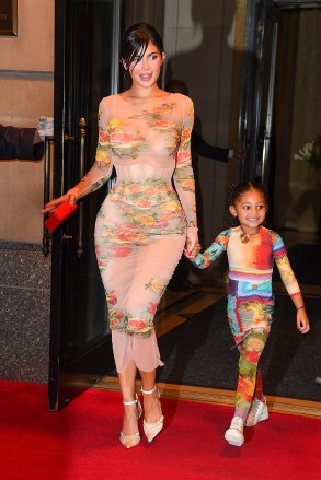 New York, NY  - Kylie Jenner looks amazing as she exits the Ritz-Carlton Hotel with her daughter Stormi to attend Jean Paul Gaultier x The Webster Celebrate the Launch of “Flower Collection” this evening in New York City.Pictured: Kylie JennerBACKGRID USA 2 MAY 2023 USA: +1 310 798 9111 / usasales@backgrid.comUK: +44 208 344 2007 / uksales@backgrid.com*UK Clients - Pictures Containing ChildrenPlease Pixelate Face Prior To Publication*