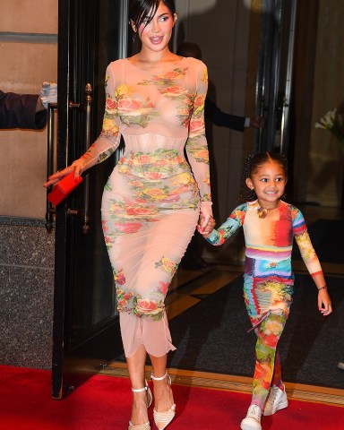 New York, NY  - Kylie Jenner looks amazing as she exits the Ritz-Carlton Hotel with her daughter Stormi to attend Jean Paul Gaultier x The Webster Celebrate the Launch of “Flower Collection” this evening in New York City.Pictured: Kylie JennerBACKGRID USA 2 MAY 2023 USA: +1 310 798 9111 / usasales@backgrid.comUK: +44 208 344 2007 / uksales@backgrid.com*UK Clients - Pictures Containing ChildrenPlease Pixelate Face Prior To Publication*