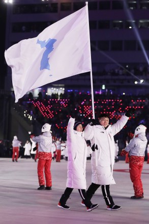 North Korea's Hwang Chung Gum and South Korea's Won Yun-jong arrive during the opening ceremony of the 2018 Winter Olympics in Pyeongchang, South Korea
Olympics Opening Ceremony, Pyeongchang, South Korea - 09 Feb 2018