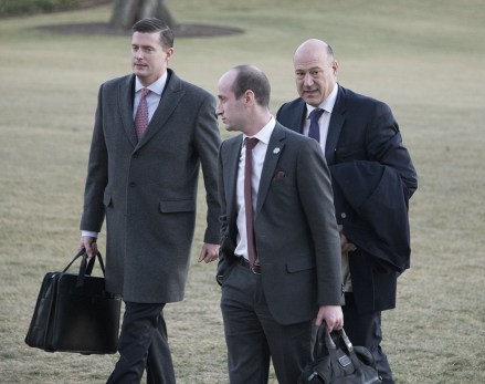 White House Staff Secretary Rob Porter (L) Senior Advisor to the President Stephen Miller, (C) and Director of the National Economic Council and chief economic advisor Gary Cohn, ( R)walk on the South Lawn as they return with the US President (out of frame) to the White House in Washington, DC  USA, 18 January 2018.  The president was returning from a trip to Pittsburgh, Pennsylvania.
Trump Arrives at the White House, Washington, USA - 18 Jan 2018