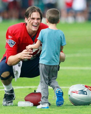 Tom Brady New England Patriots' Tom Brady greets his son Jack on the field after NFL football training camp, in Foxborough, Mass
Patriots Camp Football, Foxborough, USA