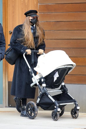 Model Gigi Hadid was spotted walking her daughter in a stroller for the first time in NYC. Photo: Gigi Hadid Ref: SPL5203160 151220 NON-EXCLUSIVE Photo: Christopher Peterson / SplashNews.com Splash News and Pictures USA: +1 310-525-5808 London: +44 (0)20 8126 1009 Berlin: +49 175 3764 166 photodesk@splashnews.com World Rights