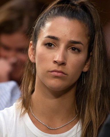 American gymnast and two-time Olympic gold medalist Aly Raisman listens as the United States Senate Committee on Commerce, Science and Transportation Subcommittee on Consumer Protection, Product Safety, Insurance, and Data Security holds a hearing "Regarding the Future of Amateur Athlete Safety" on Capitol Hill  Raisman is one of the many victims sexually abused by former US Olympic team physician, Larry Nassar.
Senate Commerce, Science and Transportation subcommittee hearing on 'Strengthening and Empowering US Amateur Athletes - Moving Forward With Solutions'., Washington, USA - 24 Jul 2018