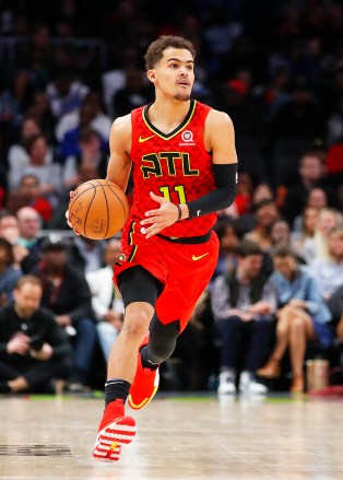 Atlanta Hawks guard Trae Young (11) drives downcourt in the second half of an NBA basketball game against the Milwaukee Bucks, Sunday, March 31, 2019, in Atlanta. (AP Photo/Todd Kirkland)