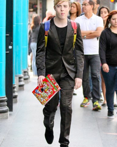 Hollywood, CA - *EXCLUSIVE* Hollywood, CA - TV Presenter and Personality John Grimes, from the duo 'Jedward' looks all dressed up minding his own business while enjoying a snack on the go at the Hollywood Walk of Fame.

AKM-GSI        March 3, 2014

To License These Photos, Please Contact :

Steve Ginsburg
(310) 505-8447
(323) 423-9397
steve@akmgsi.com
sales@akmgsi.com

or

Maria Buda
(917) 242-1505
mbuda@akmgsi.com
ginsburgspalyinc@gmail.com 
03/03/2014 
Copyright © 2014 AKM-GSI, Inc. 
Steve Ginsburg
310.798.9111 x227
310.505.8447
steve@akmgsi.com
sales@akmgsi.com