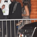 Chadwick Boseman, Regina Hall, and Gabrielle Union exit the 2018 Vanity Fair Oscar Party