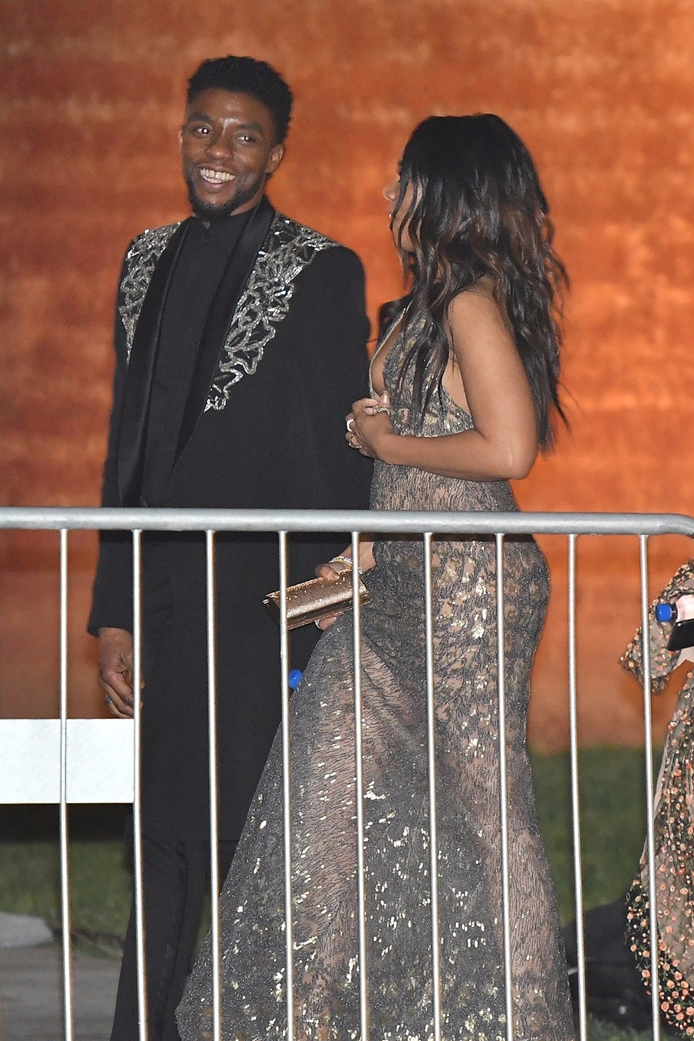 Chadwick Boseman, Regina Hall, and Gabrielle Union exit the 2018 Vanity Fair Oscar Party