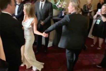 Los Angeles, CA - *EXCLUSIVE* - Like the old days?  In a moment fans have been waiting for more than 14 years, Brad Pitt looked delighted as he greeted his ex Jennifer Aniston backstage at the SAG Awards.  The once golden couple of Hollywood had a brief meeting backstage when Brad greeted Jen with a kiss on the cheek and the two made an affectionate gesture, holding hands briefly before parting.  Brad remained backstage taking official pictures with his award and stopped to watch him overjoyed and exclaimed "Oh Wow!'' as he watched Aniston take the stage.  Photo: Jennifer Aniston and Brad PittBACKGRID USA JANUARY 20, 2020 TRACKING ONLINE MUST READ: The Grosby Group / BACKGRIDUSA: +1 310 798 9111 / usasales@backgrid.comUK: +44 208 344 2007 / uksales@backgrid.com*Guests UK - Images with childrenPlease pixelate faces before publishing*