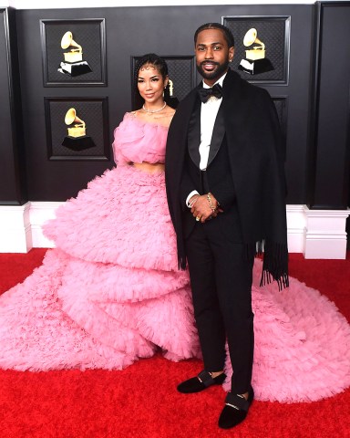 Jhene Aiko, left, and Big Sean arrive at the 63rd annual Grammy Awards at the Los Angeles Convention Center on March 14 with both live and prerecorded segments
63rd Annual Grammy Awards - Arrivals, Los Angeles, United States - 14 Mar 2021
Wearing Monsoori