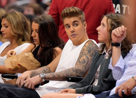 Justin Bieber, Pattie Mallette Singer Justin Bieber, attending a Los Angeles Clippers game in Los Angeles. Bieber pleaded no contest on to misdemeanor vandalism for throwing eggs at a neighbor's Calabasas home in January and was sentenced to two years probation
Bieber Egging Charges, Los Angeles, USA