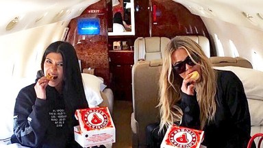 Khloe Kardashian eating Popeyes