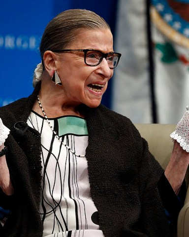 In this Sept. 20, 2017 photo, U.S. Supreme Court Justice Ruth Bader Ginsburg reacts to applause as she is introduced by William Treanor, Dean and Executive Vice President of Georgetown University Law Center, at the Georgetown University Law Center campus in Washington.  During a speech in September at Georgetown University’s law school the 84-year-old referred to herself as “Rapid Ruth” and to Justice Sonia Sotomayor as “Swift Sonia.”  The Supreme Court on Wednesday handed down its first opinion in a case heard this term. And it was Ginsburg, the court’s oldest justice, who authored the unanimous opinion.  (AP Photo/Carolyn Kaster)