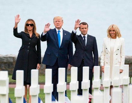 Melania and Donald Trump, Emmanuel and Brigitte Macron. US President Donald Trump and French President Emmanuel Macron during a French-US ceremony at the Normandy American Cemetery and Memorial . Colleville sur Mer, FRANCE-06/06/2019 (Sipa via AP Images)