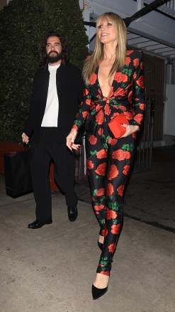 Santa Monica, CA  - *EXCLUSIVE*  - Heidi Klum is sexy in a rose flower body suit as she and her husband Tom Kaulitz steps out to dinner with friends at Giorgio Baldi in Santa Monica.Pictured: Heidi Klum, Tom KaulitzBACKGRID USA 23 DECEMBER 2022 BYLINE MUST READ: ShotbyNYP / BACKGRIDUSA: +1 310 798 9111 / usasales@backgrid.comUK: +44 208 344 2007 / uksales@backgrid.com*UK Clients - Pictures Containing ChildrenPlease Pixelate Face Prior To Publication*