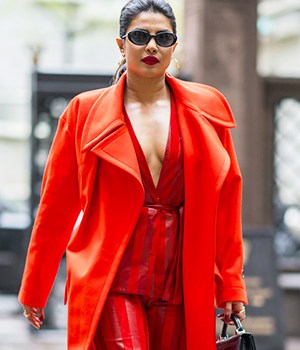 Priyanka Chopra is seen wearing all red Alejandro Alonso Rojas top and pants with a Vivienne Westwood jacket and Christian Louboutin shoes in MidtownPictured: Priyanka ChopraRef: SPL1687325 250418 Picture by: Peter Parker/Splash NewsSplash News and PicturesLos Angeles:310-821-2666New York:212-619-2666London:870-934-2666photodesk@splashnews.com