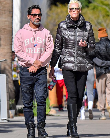 EXCLUSIVE: Brigitte Nielsen & Husband Mattia Dessì are seen out for a walk in Studio City. 27 Feb 2023 Pictured: Brigitte Nielsen, Mattia Dessì. Photo credit: @CelebCandidly / MEGA TheMegaAgency.com +1 888 505 6342 (Mega Agency TagID: MEGA948466_002.jpg) [Photo via Mega Agency]