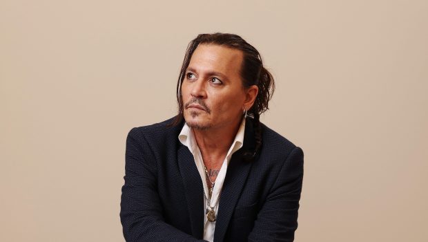 Johnny Depp poses in the portrait studio during the Red Sea International Film Festival