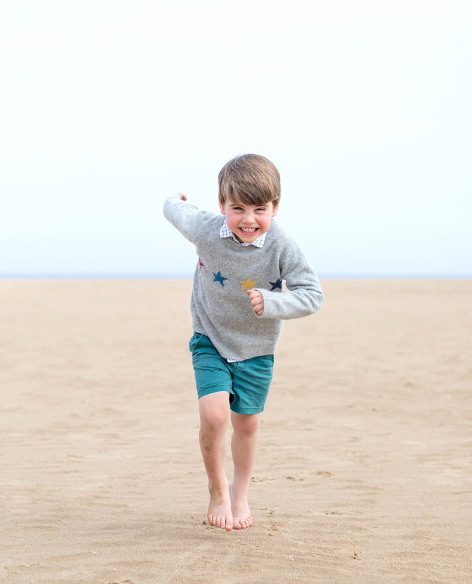 Prince Louis spends time on the beach