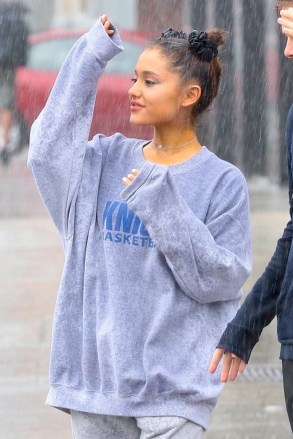 New York, NY  - Arianna Grande enjoys a stroll in the rain with her friends this afternoon in NYC after missing the Emmys last night.Pictured: Ariana GrandeBACKGRID USA 18 SEPTEMBER 2018 BYLINE MUST READ: BlayzenPhotos / BACKGRIDUSA: +1 310 798 9111 / usasales@backgrid.comUK: +44 208 344 2007 / uksales@backgrid.com*UK Clients - Pictures Containing ChildrenPlease Pixelate Face Prior To Publication*