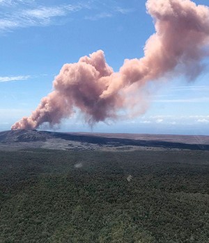 In this photo provided by the U.S. Geological Survey, red ash rises from the Puu Oo vent on Hawaii's Kilauea Volcano after a magnitude-5.0 earthquake struck the Big Island, in Hawaii Volcanoes National Park. The temblor Thursday is the latest and largest in a series of hundreds of small earthquakes to shake the island's active volcano since the Puu Oo vent crater floor collapsed and caused magma to rush into new underground chambers on Monday. Scientists say a new eruption in the region is possibleHawaii Volcano-Earthquake - 03 May 2018