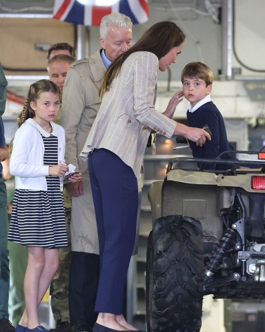 The Prince and Princess of Wales, Prince George, Princess Charlotte and Prince Louis visit the Air Tattoo at RAF Fairford, in Fairford, Gloucestershire, UK, on the 14th July 2023. 14 Jul 2023 Pictured: The Prince and Princess of Wales, Prince George, Princess Charlotte and Prince Louis visit the Air Tattoo at RAF Fairford, in Fairford, Gloucestershire, UK, on the 14th July 2023. Photo credit: James Whatling / MEGA TheMegaAgency.com +1 888 505 6342 (Mega Agency TagID: MEGA1007287_009.jpg) [Photo via Mega Agency]