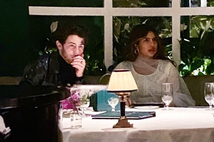 Beverly Hills, CA - *EXCLUSIVE* - Nick Jonas proves to be a supportive husband as he celebrates Diwali with his wife Priyanka Chopra and her mother at the Beverly Hills Hotel.Pictured: Nick Jonas, Priyanka ChopraBACKGRID USA 24 OCTOBER 2022 BYLINE MUST READ: affinitypicture / BACKGRIDUSA: +1 310 798 9111 / usasales@backgrid.comUK: +44 208 344 2007 / uksales@backgrid.com*UK Clients - Pictures Containing ChildrenPlease Pixelate Face Prior To Publication*