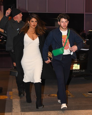 New York, NY  - *EXCLUSIVE*  - The Jonas Brothers, Nick, Joe, and Kevin with Priyanka Chopra, and Daniella Jonas are seen walking from Bar Centrale restaurant to the Marquis Theater in Times Square, New York City.Pictured: Nick Jonas, Priyanka ChopraBACKGRID USA 19 MARCH 2023 BYLINE MUST READ: ROKA / BACKGRIDUSA: +1 310 798 9111 / usasales@backgrid.comUK: +44 208 344 2007 / uksales@backgrid.com*UK Clients - Pictures Containing ChildrenPlease Pixelate Face Prior To Publication*