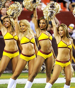 Washington Redskin cheerleaders perform during the second half of the NFL football game between the Tampa Bay Buccaneers and the Washington Redskins, in Landover, MdBuccaneers Redskins Football, Landover, USA - 29 Aug 2012