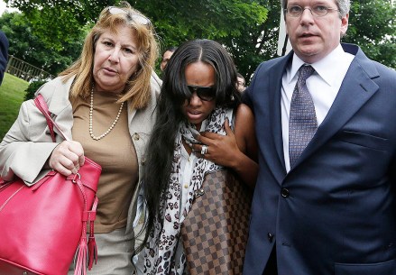 Shayanna Jenkins, Janice Bassil Shayanna Jenkins, middle, fiancee of former New England Patriots football player Aaron Hernandez, is escorted by attorney Janice Bassil, left, and an unidentified attorney after a bail hearing in Fall River Superior Court in Fall River, Mass. Hernandez, charged with murdering Odin Lloyd, a 27-year-old semi-pro football player, was denied bail
Hernandez Police Football, Fall River, USA
