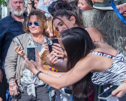 Johnny Depp with fans in front of Stadthalle Offenbach Johnny Depp with fans in front of Offenbach City Hall, Hesse, Germany - July 6, 2022