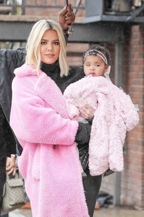 *EXCLUSIVE* Calabasas, CA - Khloe Kardashian sets aside Tristan Thompson and Jordyn Woods cheating play to take her daughter True out to lunch.  Khloe stood out in a vibrant pink coat hanging out.  This is the first time Khloe has been seen since Jordyn Woods appeared on Jada Pinkett Smith's "The conversation on the red table" show to discuss the cheating scandal.  Taken on 02/03/19 Photo: Khloe Kardashian BACKGRID USA 03/03/2019 US: +1 310 798 9111 / usasales@backgrid.com UK: +44 208 344 2007 / uksales@backgrid.com * UK Customers - Pictures With Children Please Pixelate Face Before Publishing *