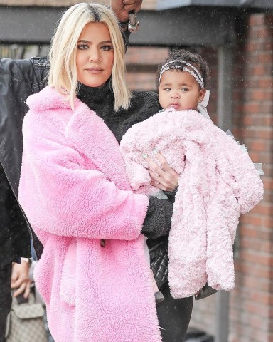 *EXCLUSIVE* Calabasas, CA  - Khloe Kardashian puts the Tristan Thompson and Jordyn Woods cheating drama to the side to take her daughter True out for lunch. Khloe stands out in a bright pink coat for the outing. This is the first time Khloe has been seen out since Jordyn Woods appeared on Jada Pinkett Smith's "Red Table Talk" show to discuss the cheating scandal. Shot on 03/02/19  Pictured: Khloe Kardashian  BACKGRID USA 3 MARCH 2019   USA: +1 310 798 9111 / usasales@backgrid.com  UK: +44 208 344 2007 / uksales@backgrid.com  *UK Clients - Pictures Containing Children Please Pixelate Face Prior To Publication*