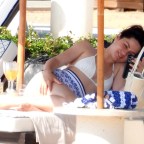 EXCLUSIVE: Ana De Armas seens wearing Louis Vuitton bikini at the beach in Greece