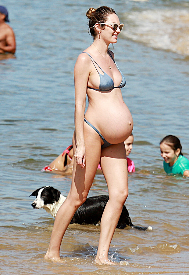 Candice Swanepoel rocks huge baby bump in bikini days before due date