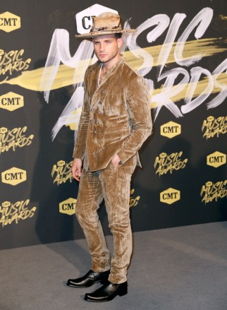 Nico Tortorella arrives at the CMT Music Awards at the Bridgestone Arena on Wednesday, June 6, 2018, in Nashville, Tenn. (AP Photo/Al Wagner)