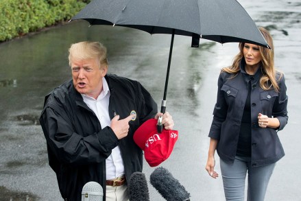 US President Donald J. Trump (L) delivers remarks to members of the news media beside First Lady Melania Trump (R), at the South Lawn of the White House before departing by Marine One, in Washington, DC, USA, 15 October 2018. Trump travels to the Florida Pandhandle and Georgia to view damage from Hurricane Michael. Before departing, Trump said he had spoken to the Saudi King Salman, regarding missing Washington Post contributor Jamal Khashoggi, and that US Secretary of State Mike Pompeo will meet with the Saudi King.
US President Donald J. Trump and First Lady Melania Trump depart the White House, Washington, USA - 15 Oct 2018