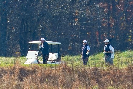 President Donald Trump participates in a round of golf at the Trump National Golf Course on Saturday, Nov. 7, 2020, in Sterling, Va. (AP Photo/Patrick Semansky)