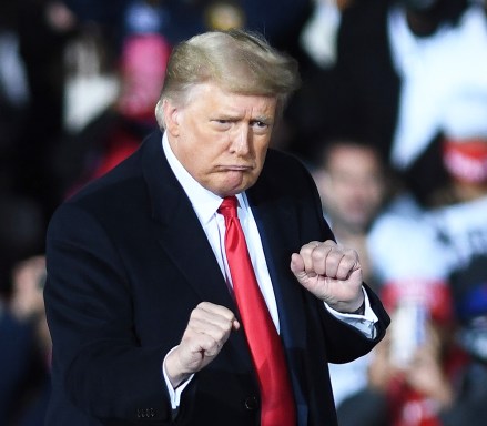 U.S. President Donald Trump dances after speaking at a Republican National Committee Victory Rally in support of incumbent Republican Senate candidates Sen. Kelly Loeffler (R-GA) and Sen. David Perdue (R-GA) at the Dalton Regional Airport. Trump Campaigns for Georgia Senate Candidates in Dalton, USA - 4 Jan 2021