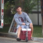 EXCLUSIVE: Jax Tayloris seen riding a customized ice chest scooter