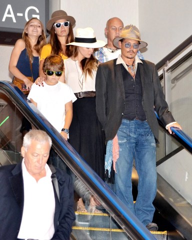 Johnny Depp, Jack Depp, Lily-Rose Melody Depp and Amber Heard
Johnny Depp at Narita International airport, Chiba pref, Japan - 18 Jul 2013