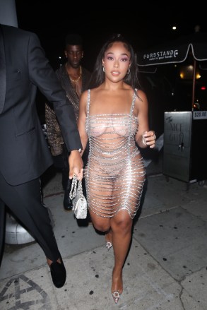 West Hollywood, CA  - Jordyn Woods looks stunning in a revealing jewel chain dress as she celebrates her birthday with boyfriend Karl Anthony Towns at The Nice Guy in West Hollywood.Pictured: Jordyn Woods, Karl Anthony TownsBACKGRID USA 18 SEPTEMBER 2021 USA: +1 310 798 9111 / usasales@backgrid.comUK: +44 208 344 2007 / uksales@backgrid.com*UK Clients - Pictures Containing ChildrenPlease Pixelate Face Prior To Publication*
