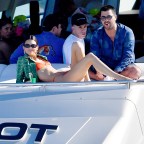 Kendall Jenner orange Bikini During Boat Ride miami