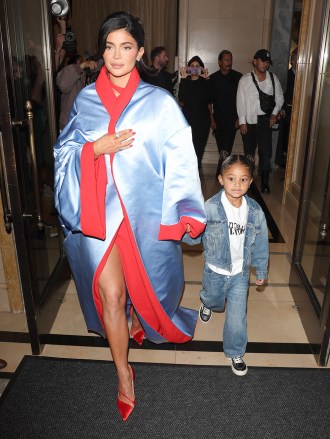 Kylie Jenner Stuns in a Blue and Red Satin Outfit with daughter Stormi Webster while heading to the Met Gala in NYC. 01 May 2023 Pictured: Kylie Jenner, Stormi Webster. Photo credit: TheRealSPW / MEGA TheMegaAgency.com +1 888 505 6342 (Mega Agency TagID: MEGA975498_001.jpg) [Photo via Mega Agency]